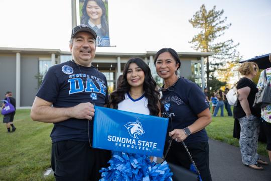 Parents and Student with Sonoma State sign 